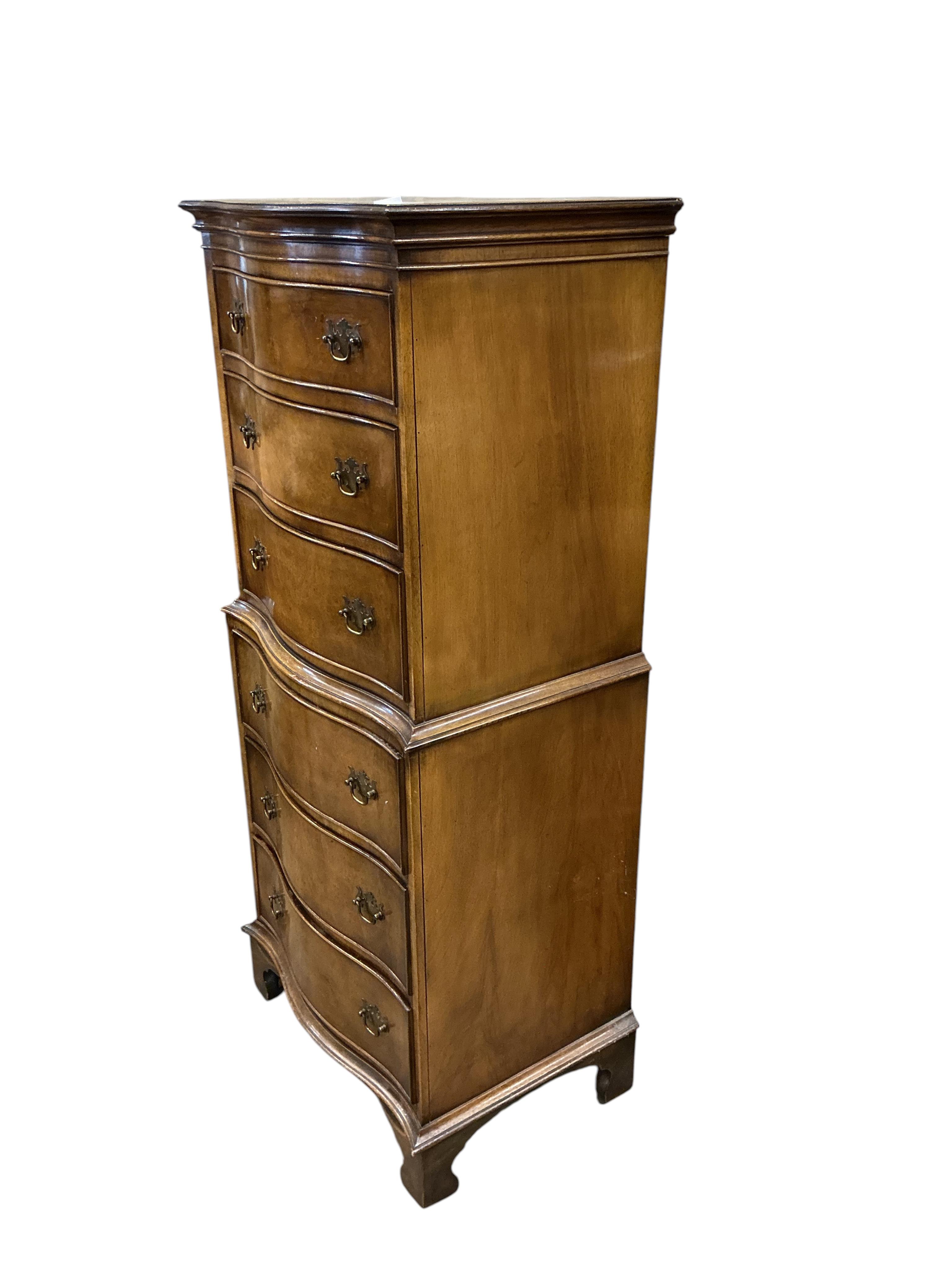 A reproduction George I style narrow walnut serpentine six drawer chest, width 55cm, depth 39cm, height 130cm